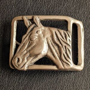 Vintage horse head belt buckle. Solid brass heavy squash unisex belt buckle.